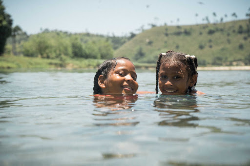 DR-Children-Playing-in-Water-2.jpg - Cruise to Puerto Plata in the Dominican Republic.