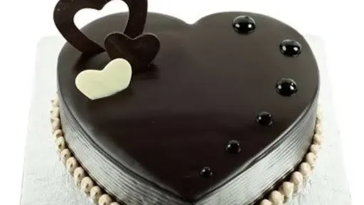 Chocolate Truffle Heart Shape Cake [500 Grams] With 10 Red Roses Bunch