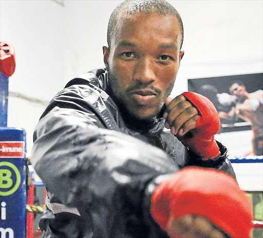 ON NEW TERRAIN: Simpiwe Vetyeka, seen here in training, will be taking on Colombian Rudolfo Puente in a world featherweight title eliminator at Selborne Tennis Courts Picture: STEPHANIE LLOYD