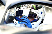 Valtteri Bottas of Finland and Mercedes GP prepares to drive in the garage during practice for the F1 Grand Prix of Great Britain at Silverstone on July 12, 2019 in Northampton, England.