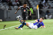 Monnapule Saleng of  Orlando Pirates and Bradley Cross of Maritzburg United during the DStv Premiership match between Orlando Pirates and Maritzburg United at Orlando Stadium on February 17, 2023 in Johannesburg.