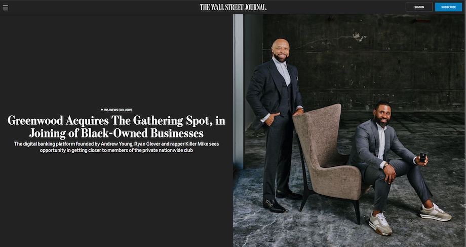 A tearsheet for the Wall Street Journal with two men in business suits. One is standing behind the armchair the other is sitting on. They both are looking at the camera with big smiles and confident, relaxed postures. This is an example of editorial portrait photography.