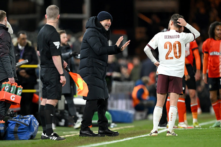 Pep Guardiola reacts towards Bernardo Silva of Manchester City during the FA Cup match against Luton Town last week.