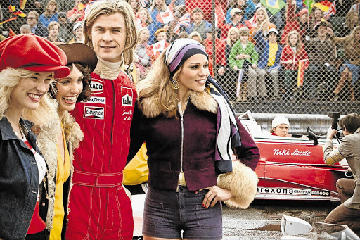 FRENEMIES: Chris Hemsworth stars as James Hunt in 'Rush', which tells the tale of his fierce rivalry with Niki Lauda in 1976