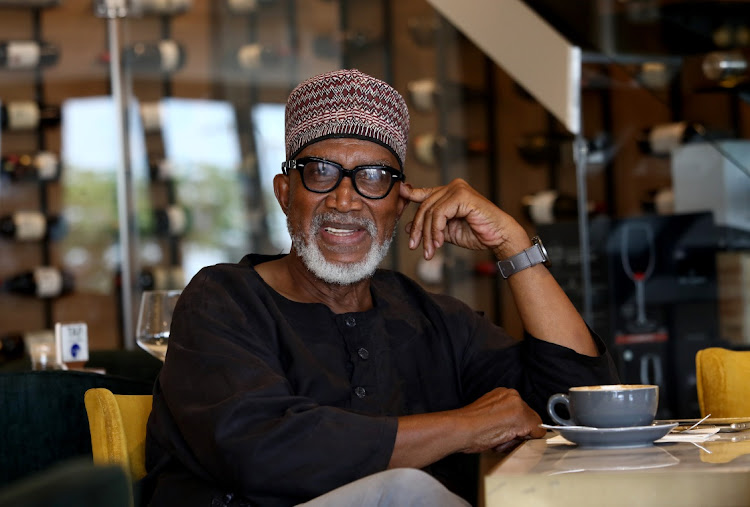 Legendary musician Sipho Hotstix Mabuse at 1947 restaurant in Soweto.