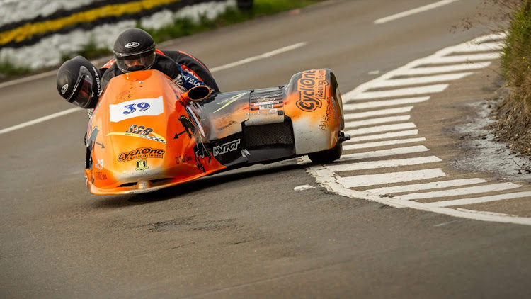 French sidecar passenger Olivier Lavorel, rear, died on Saturday of injuries suffered in a crash at the Isle of Man TT.