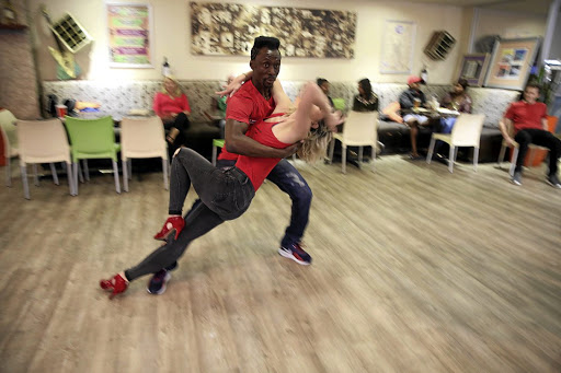 Evans Dogbe and Tina Velkushanova have found salsa freedom at Zack's restaurant.