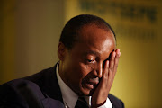 Patrice Motsepe as he and his wife said they were giving half their wealth to charity in 2013