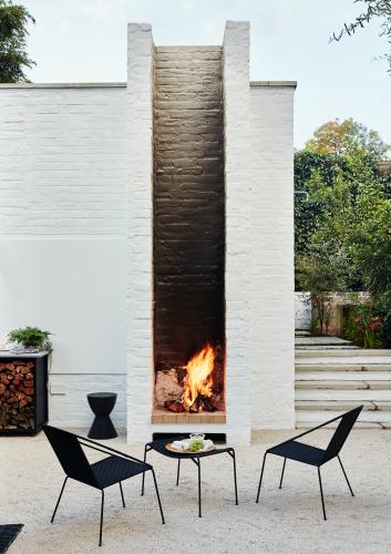 The garden furniture is a modern take on a design for wire furniture very popular in South Africa between the 1960s and 1980s. The aerophyte on the olive tree in the lawn has travelled with Nico and Christo in every house they have lived in together, originally a gift from old neighbours.