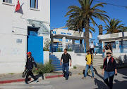 People leave a train station, as Tunisia relaxes some of its lockdown rules while keeping other restrictions in place. File photo 