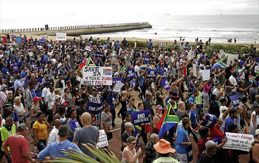 Demonstrators take part in a protest calling for the removal of President Jacob Zuma in Durban on Friday after the sacking of finance minister Pravin Gordhan. Similar protests were held in other cities.