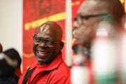 Newly elected general secretary of the SACP Solly Mapaila and new chairperson Blade Nzimande share a light moment at a press conference at the party's national congress on July 13 2022 in Boksburg. 