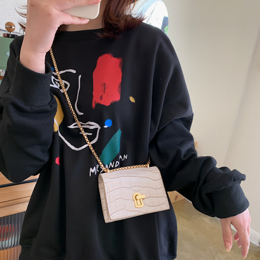 Title 2, Textured mini bag for effortless style. Carry y...