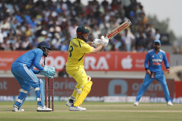 Mitchell Marsh of Australia plays a shot in game three of the One Day International series against India at Saurashtra Cricket Association Stadium in Rajkot, India on September 27.