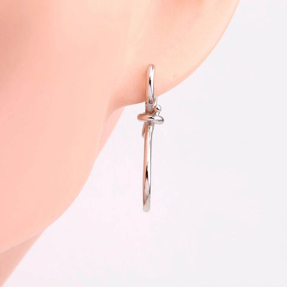Boucles d'oreilles longues à clip S925 argent sterling style Hong Kong, torsadées, 8 mots, design simple et tendance.