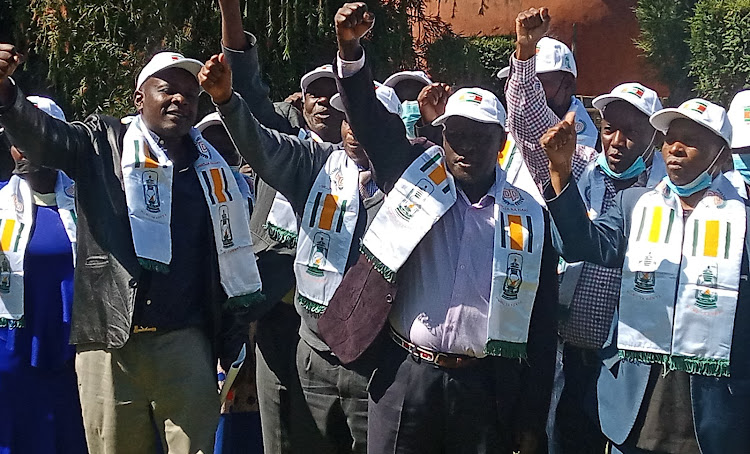 Democratic Party branch officials after a meeting in Eldoret on December 12.