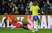 Vinicius Junior of Brazil is challenged by Mohammed Kudus of Ghana in the international friendly at Stade Oceane in Le Havre, France on September 23 2022.