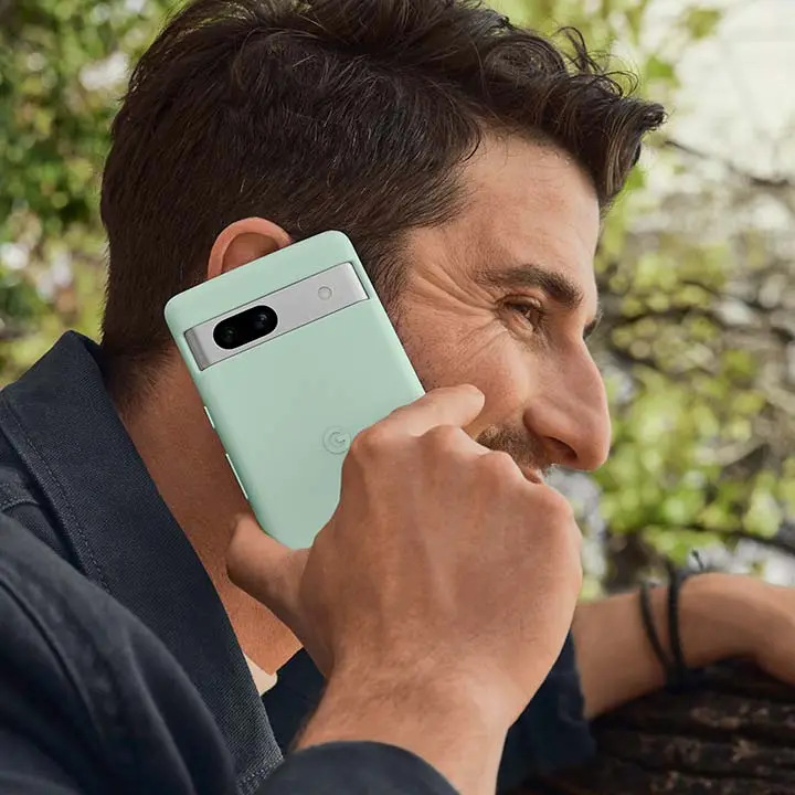 A person uses their Pixel phone for a call