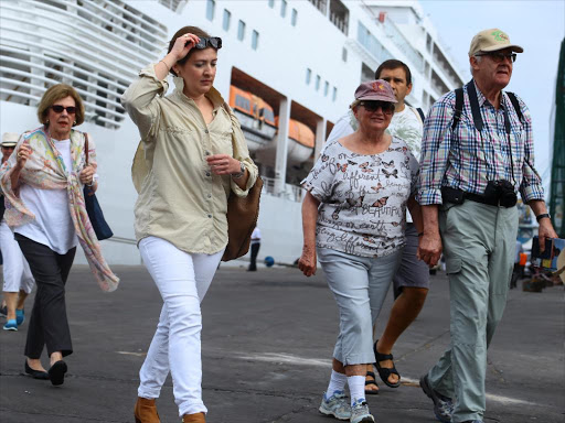 Tourists disembarking from Ms Silver Spirit which docked at the Mombasa port with over 800 visitors 496 passengers and 394 crew members.The ship, which was from Zanzibar, made a stop at the Kenyan coast on its way to Seychelles.January 29, 2018./JOHN CHESOLI