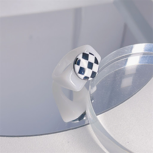 Title 4, Summer Round Geometric Checker Ring for a styli...