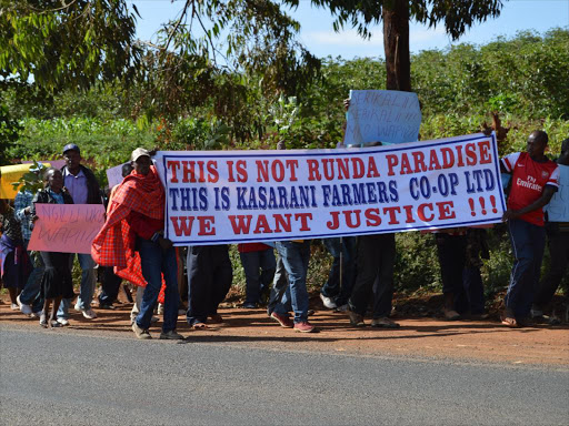 Shareholders of Kasarini farmers cooperative society limited protest along Kiambu road over 2000 acres of land grabbed by private developers in Kiambu. FILE