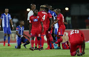 Players argue with the referee during the Absa Premiership match between Maritzburg United and SuperSport United at Harry Gwala Stadium on January 17, 2018 in Pietermaritzburg. 
