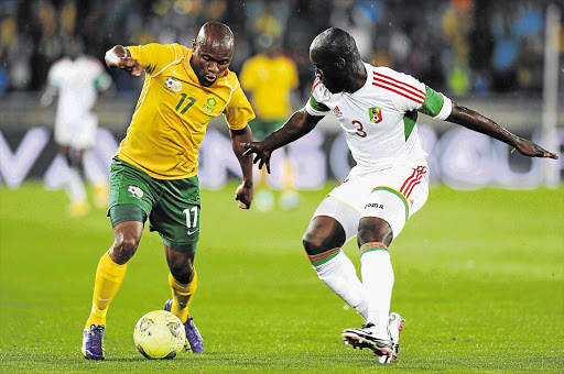 NOT THIS TIME: South Africa's Tokelo Rantie takes on Congo's Igor N'Ganga during the Group A Africa Cup of Nations qualifier between the two teams at Peter Mokaba Stadium in Polokwane last night. The game ended in a goalless draw