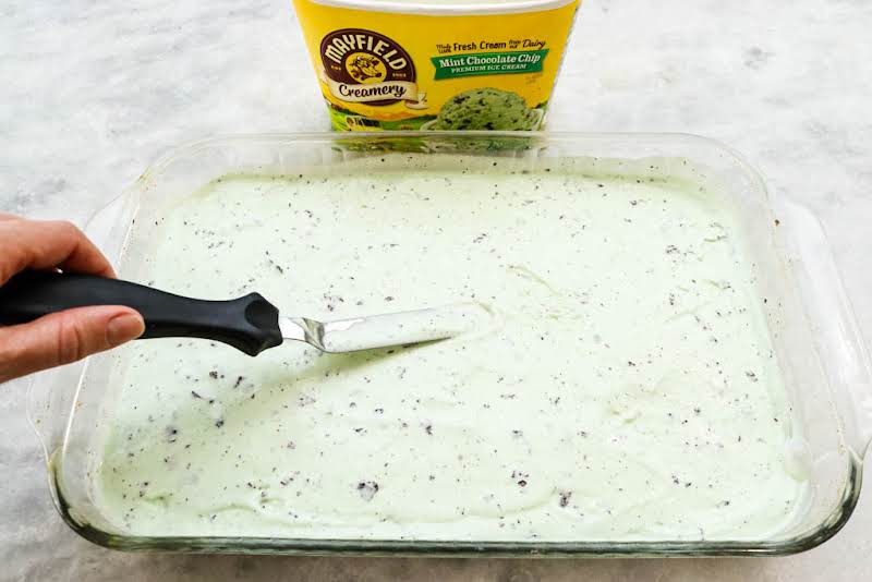 Spread Softened Mint Chocolate Chip Ice Cream Over The Crust.