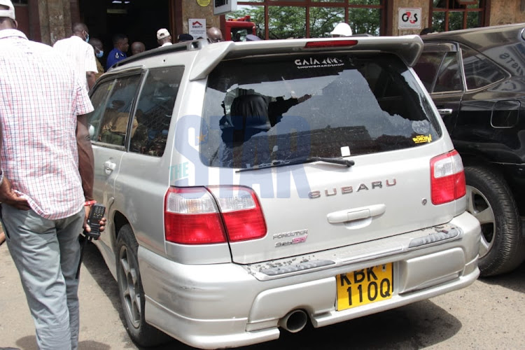 A car believed to have been used by the robbers parked outside Equity bank. PHOTO/DANIEL OGENDO