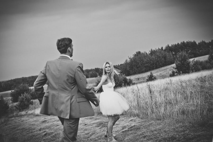 婚礼摄影师Jakub Kobalczyk（pofoto）。2014 2月15日的照片