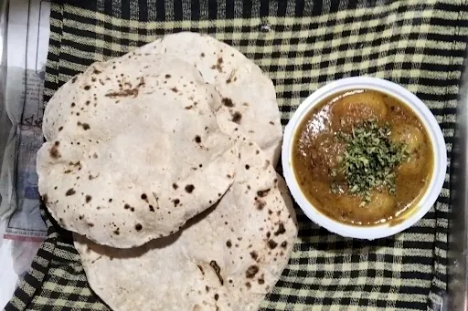 Aloo Dum With 10 Butter Roti And Pickle