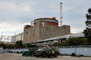 A Russian all-terrain armoured vehicle is parked outside the Zaporizhzhia Nuclear Power Plant. 