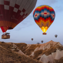 Hot air balloons floating in the sunset