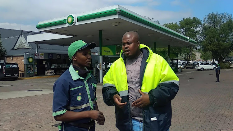 Sphamadla 'Wiseman' Ndabezitha and Phakamazi Mbokazi at the BP garage in Hilton on Thursday.