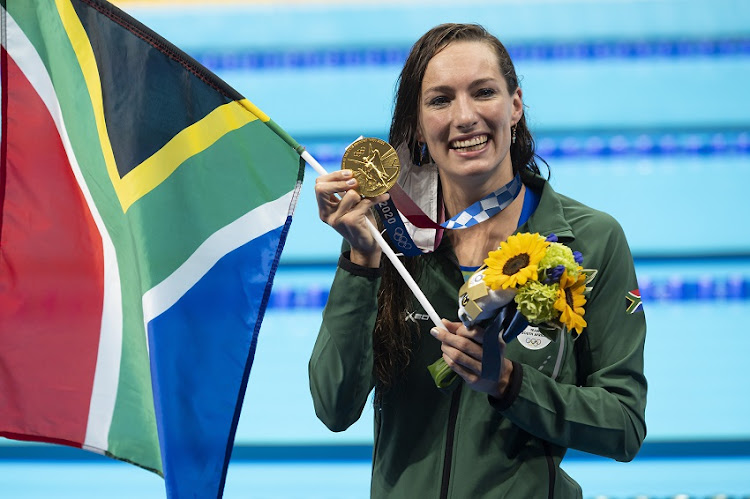 Tatjana Schoenmaker of SA with her gold medal after winning, with a new world record, the women's 200m breaststroke final during the Tokyo Olympic Games.