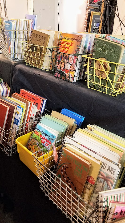 Notebooks made of children books at a booth as part of the vibe of the Portland Night Market, held every few months in the Central Industrial District in a warehouse, during the November 2016 market