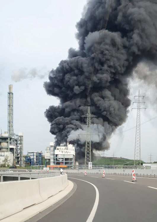 Smoke billows following an explosion in Leverkusen, Germany, July 27, 2021.