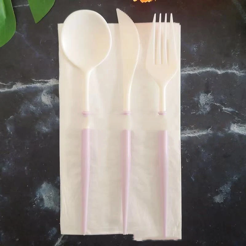 Disposable plastic cutlery set featuring fruit knife, cake knife, and small spoon. Perfect for picnics, parties, and cas
