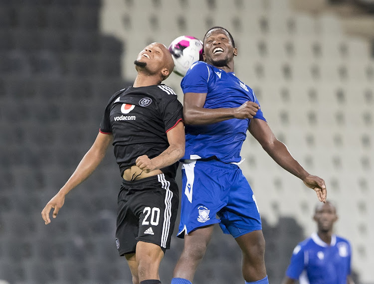 Goodman Mosele of Orlando Pirates and Sifiso Matse of Royal Leopards during the Caf Confederation Cup match at Mbombela Stadium on February 27 2022.