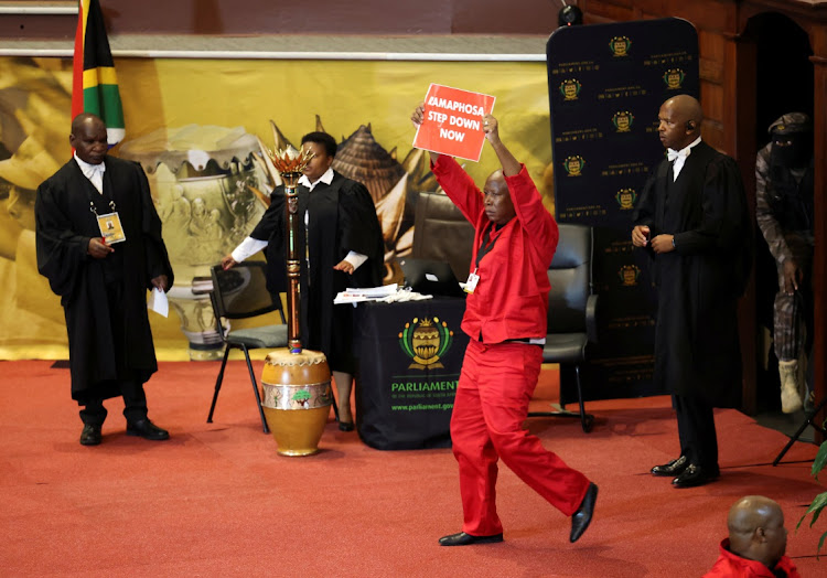 Members of the EFF stormed the stage, charging towards President Cyril Ramaphosa, in an attempt to disrupt the 2023 state of the nation address in Cape Town City Hall.