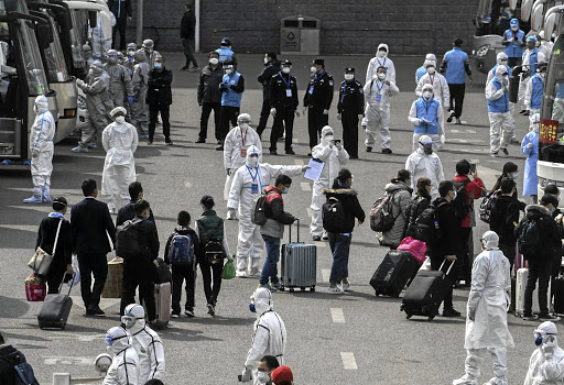 The scene in April last year in Beijing when travellers arriving from Wuhan, epicentre of the Covid outbreak, were sent to quarantine facilities. It has yet to be conclusively determined how the virus began spreading in humans, and the US is seeking to establish whether it could have escaped from a Wuhan laboratory.