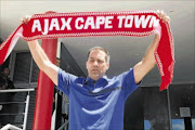 NEW LEAF: Roger de Sa shows his true colours during the Ajax Cape Town press conference at Ikamva yesterday. Photo: Lance Prinsloo/ Gallo Images