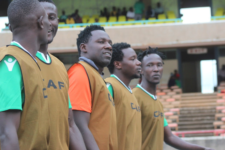 Boniface Oluoch (C) during Caf Champions League first-leg tie against USM Algiers.