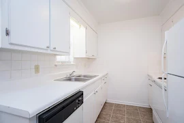 Kitchen area with tile inspired flooring