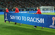 An anti-racism board is displayed during the 2017 Fifa Confederations Cup semifinal between Germany and Mexico at Fisht Olympic Stadium in Sochi, Russia in June 2017. 