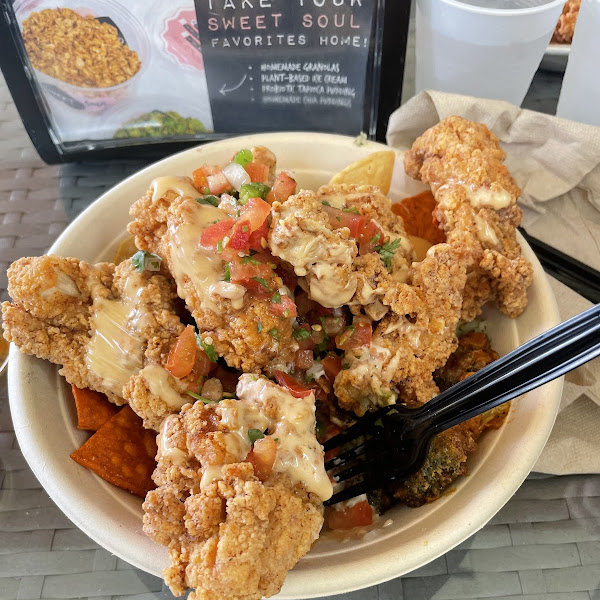 Super crispy always GF fried chicken with QUESO on top!