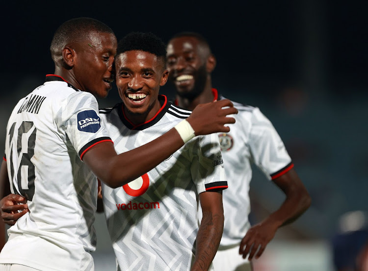 Monnapule Saleng ,Kabelo Dlamini and Deon Hotto of Pirates celebrates a goal during the DStv Premiership match between Swallows FC and Orlando Pirates at Dobsonville Stadium in Soweto.