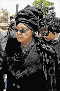 SHOCKER: Winnie Madikizela-Mandela during former president Nelson Mandela's funeral at his Qunu homestead. She has instituted a court bid to gain the home 
      PHOTO: ELMOND JIYANE