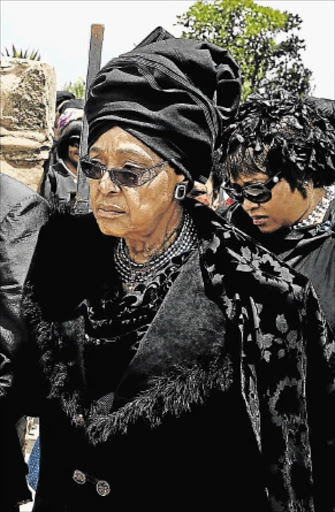 SHOCKER: Winnie Madikizela-Mandela during former president Nelson Mandela's funeral at his Qunu homestead. She has instituted a court bid to gain the home PHOTO: ELMOND JIYANE