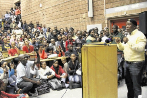 ON THE OFFENSIVE: Former ANCYL president Julius Malema addresses students at the Cape Peninsula University of Technology during the Nelson Mandela Lecture at the institution yesterday. He was accompanied by suspended league secretary- general Sindiso Magaqa and spokesman Floyd Shivambu. Photo: Elvis ka Nyelenzi